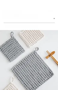 Detailed weave of Nordic square cotton rope placemats with convenient hanging loops