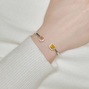 S925 silver open bracelet featuring radiant yellow rectangle and orange round stones