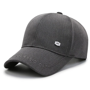 Classic dark gray baseball cap with stylish embroidery and metal side plaque detail