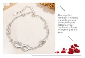 Detail of S925 silver double-layer bracelet featuring infinity symbols and zircon inlay