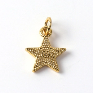 Detail of star-shaped gold-plated pendant with textured micro-pave surface for DIY jewelry
