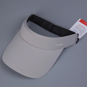 Detail of UVLABCL sports visor showing the anti-UV brim and functional sun protection tags