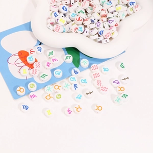 Colorful zodiac symbol beads for DIY bracelet making on a decorative cloud plate