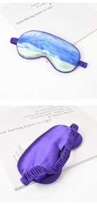 Detailed view of Van Gogh style silk eye mask showing artistic print and purple satin back