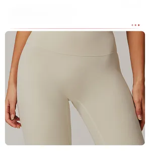 Close-up of khaki high-waisted yoga leggings featuring a seamless front design