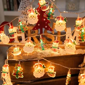 Christmas LED string lights with Santa, snowman, and tree charms for festive home decor