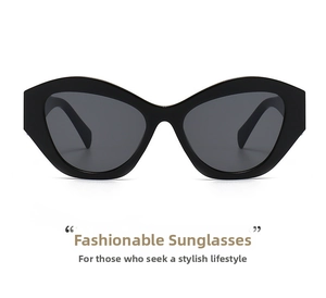 Front view of black cat-eye sunglasses featuring a thick oversized frame and grey lenses