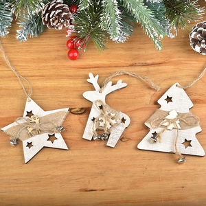 Wooden Christmas tree hanging ornaments set with star, reindeer and tree shapes. Holiday decor.