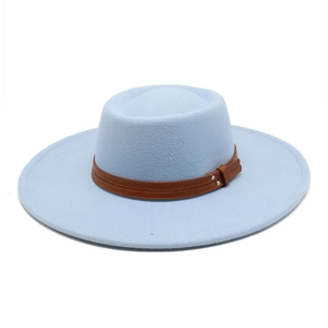 Close-up of light blue wool felt fedora featuring brown leather band and silver rivet details