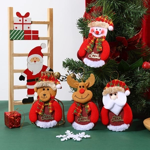 Set of 4 Christmas ornaments featuring Santa and Snowman with Merry Christmas text
