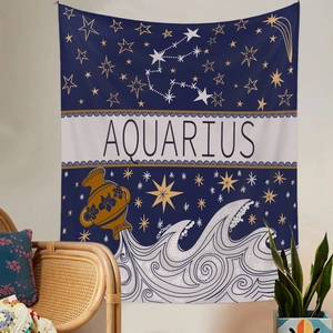 Detail view of Aquarius tapestry featuring gold stars on deep blue and white fabric background