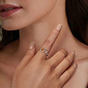 925 Sterling silver sun and moon open ring with orange gemstone on female model finger