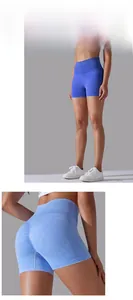 Detail of seamless scrunch butt yoga shorts showing textured blue fabric and high waist