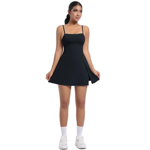 Detail view of the side slit and high-elastic fabric on this black athletic tennis dress