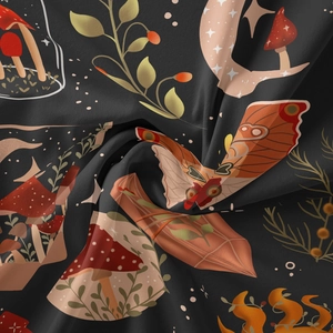 Detail of mushroom and moth pattern on dark grey fabric tapestry with celestial elements