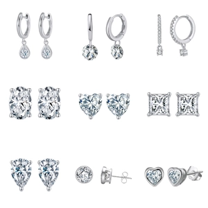 Set of nine S925 sterling silver stud earrings with sparkling clear cubic zirconia