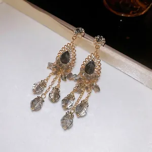 Vintage water-drop tassel earrings with crystal beads and grey gems in gold finish