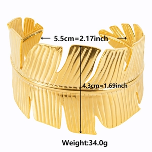 Macro view of 18k gold plated stainless steel cuff bracelet with precise size measurements