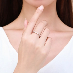 Elegant 925 sterling silver rainbow zircon wavy ring for women shown on a model