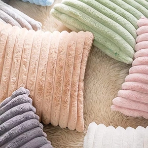 Plush faux rabbit fur pillow covers with striped texture in various soft pastel colors