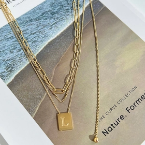 Retro triple-layer stainless steel necklace featuring a square L-letter pendant in gold