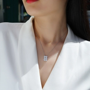 Elegant S925 sterling silver moissanite pendant necklace for women on white shirt