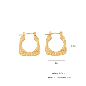 Detailed close-up of gold irregular geometric stainless steel earrings with dimensions