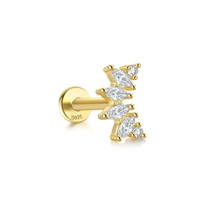 Macro shot of S925 sterling silver gold-plated butterfly earring with marquise-cut gems