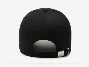 Adjustable black cotton baseball cap back view with metal buckle and strap detail