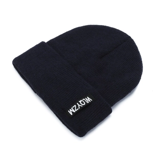 Classic navy blue ribbed knit beanie hat for men and women with woven square logo tag