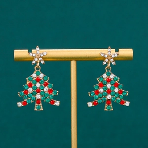 Chic Christmas tree drop earrings with colorful rhinestones on a gold display stand