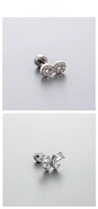 Detail of titanium steel stud earrings with infinity and butterfly zircon designs