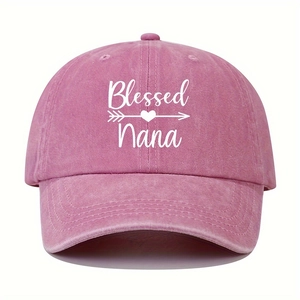 Close-up of white 'Blessed Nana' embroidery on a washed pink vintage cotton baseball cap