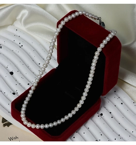 Close-up of S925 sterling silver clasp on a 5-6mm white freshwater pearl necklace