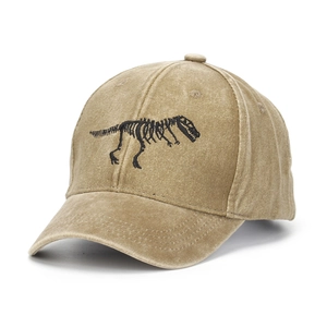 Detailed close-up of dinosaur skeleton embroidery on vintage washed cotton baseball cap