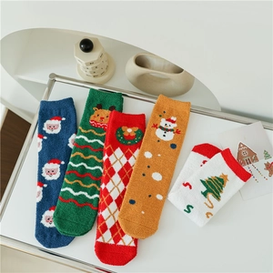 Thick Christmas coral fleece thermal socks featuring reindeer and Santa Claus motifs