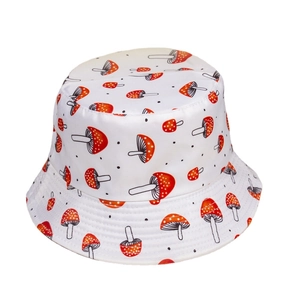 White canvas bucket hat with red mushroom print pattern for sun protection and outdoor use
