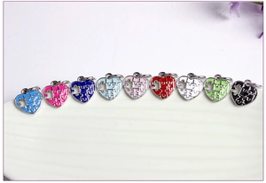 Colorful alloy puzzle heart charms in nine vibrant oil-drop finishes for DIY jewelry making