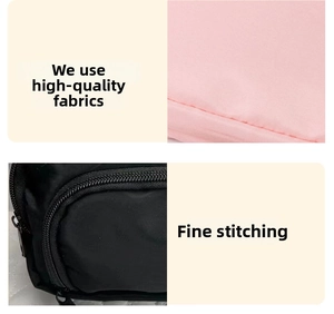 Detailed close-up of premium nylon fabric with durable metal zippers and fine stitching