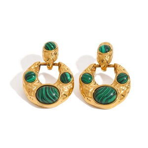 Vintage gold hammer-finish earrings with green malachite stones on white background