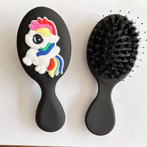 Detailed front and back view of a black air cushion hairbrush with rainbow pony decor