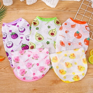 Breathable mesh pet vests in five colors with cute fruit prints on a wooden surface