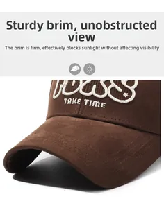 Detail of embroidered lettering on cotton twill baseball cap with firm sunshade brim