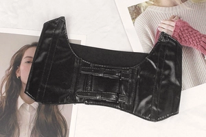 Detail of black PU leather waist belt with double prong buckles and elastic back strap