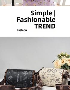 Detail view of cylindrical leather crossbody bags with letter prints and decorative straps