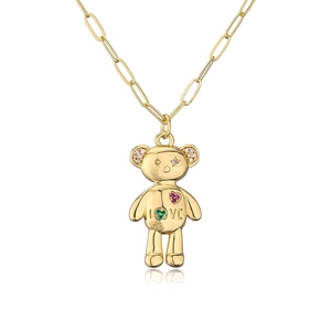 Detailed macro of 18K gold plated bear pendant with colorful zircon and LOVE engraving