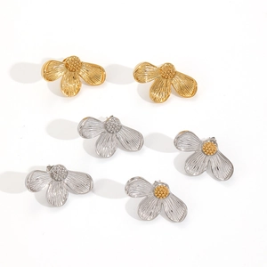 Elegant gold and silver floral stainless steel stud earrings with textured petals