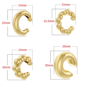 Macro detail of four gold-plated ear cuff styles including twisted and beaded textures