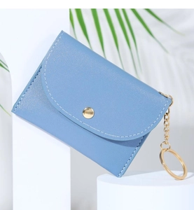 Detail of light blue PU leather card wallet with gold snap button and key ring attachment