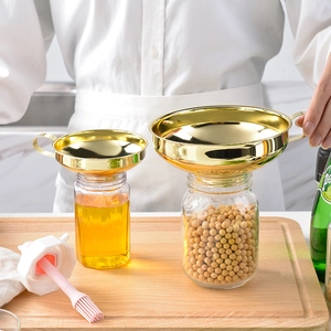 Set of two gold stainless steel wide mouth funnels with handles for jam and beans